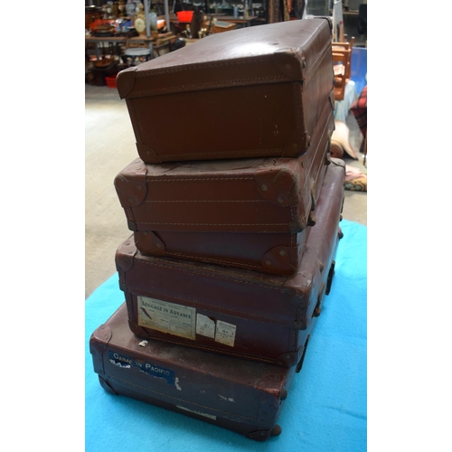 2591 - FOUR VINTAGE LEATHER SUITCASES. 66 cm x 41 cm. (4)