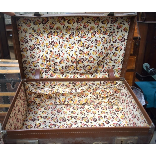 2591 - FOUR VINTAGE LEATHER SUITCASES. 66 cm x 41 cm. (4)