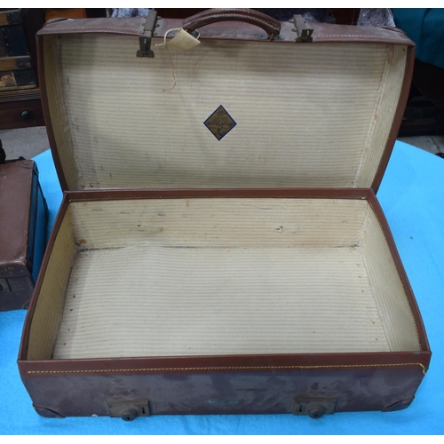 2591 - FOUR VINTAGE LEATHER SUITCASES. 66 cm x 41 cm. (4)