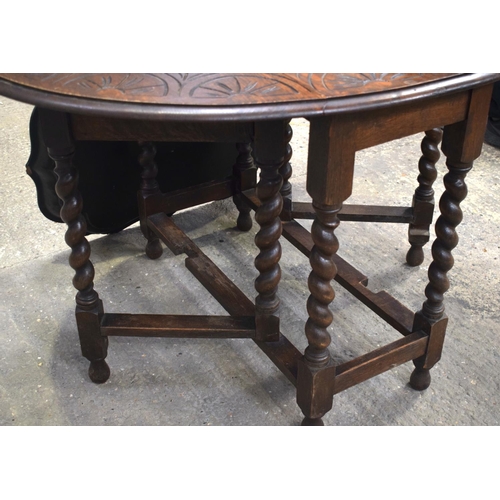 2596 - AN OAK GATELEG TABLE and a lacquer tray. 115 cm x 74 cm x 88 cm extended. (2)