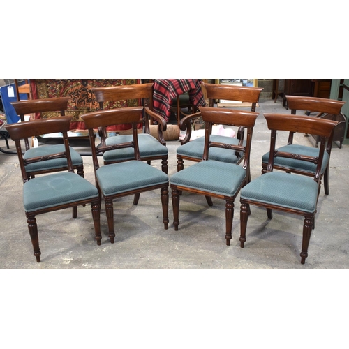 2600 - A SET OF EIGHT MAHOGANY REGENCY STYLE DINING CHAIRS with sunburst decoration to the supports and aca... 