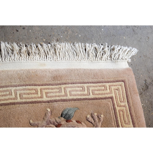 2602 - AN ART DECO STYLE CHINESE RUG. 154 cm x 87 cm.