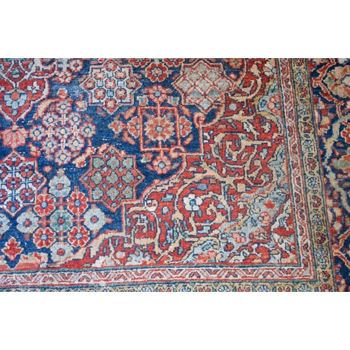 2604 - A LOVELY PAIR OF EARLY 20TH CENTURY MIDDLE EASTERN CARPETS decorated with foliage and vines. 218 cm ... 