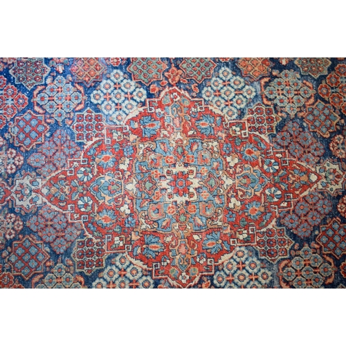 2604 - A LOVELY PAIR OF EARLY 20TH CENTURY MIDDLE EASTERN CARPETS decorated with foliage and vines. 218 cm ... 
