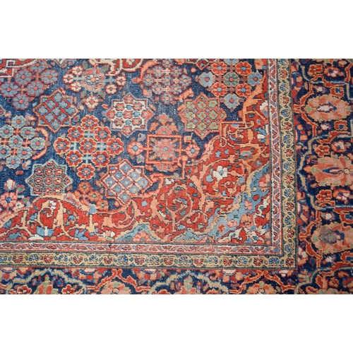 2604 - A LOVELY PAIR OF EARLY 20TH CENTURY MIDDLE EASTERN CARPETS decorated with foliage and vines. 218 cm ... 