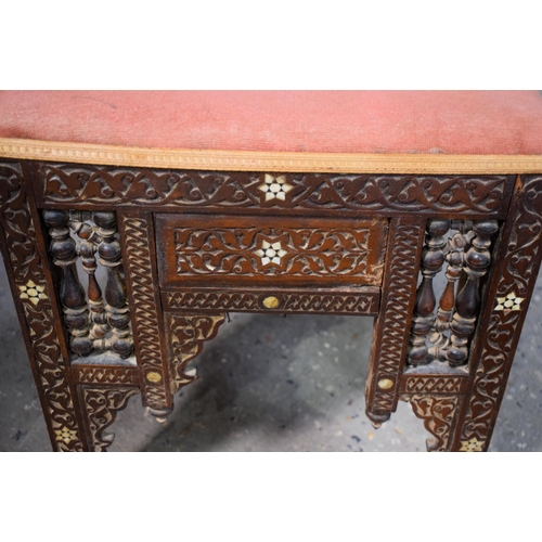 2607 - AN ARTS AND CRAFTS MOORISH CAIRO STOOL probably Liberty & Co. 47 cm x 40 cm.