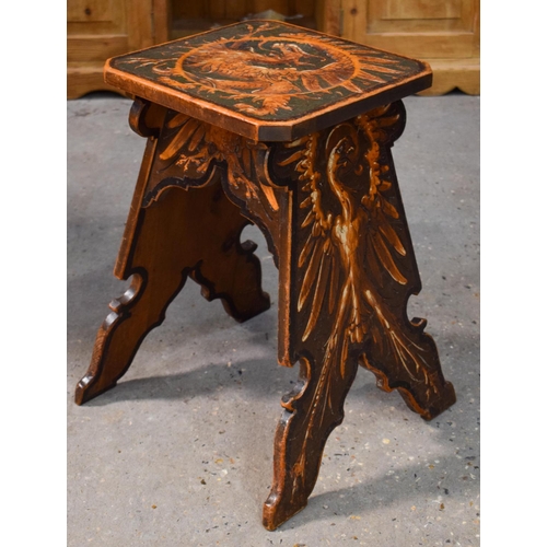2608 - A RARE CONTINENTAL ART NOUVEAU FRUITWOOD PHOENIX STOOL decorated with various birds. 52 cm x 41 cm.