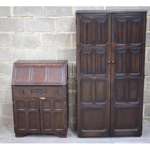 2613 - A MID CENTURY ERCOL TYPE WARDROBE together with a similar bureau. Largest 177 cm x 91 cm. (2)