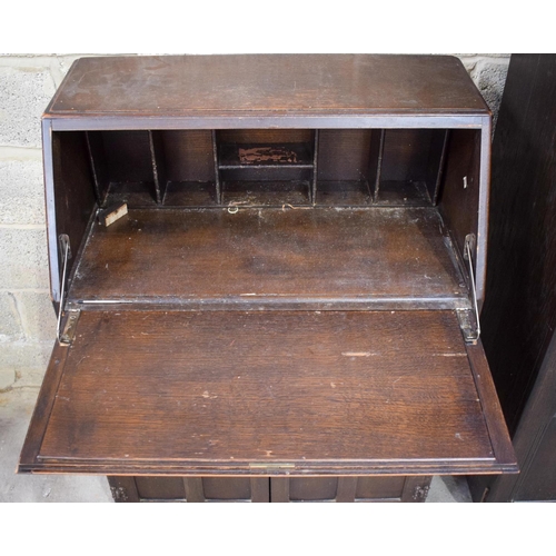 2613 - A MID CENTURY ERCOL TYPE WARDROBE together with a similar bureau. Largest 177 cm x 91 cm. (2)