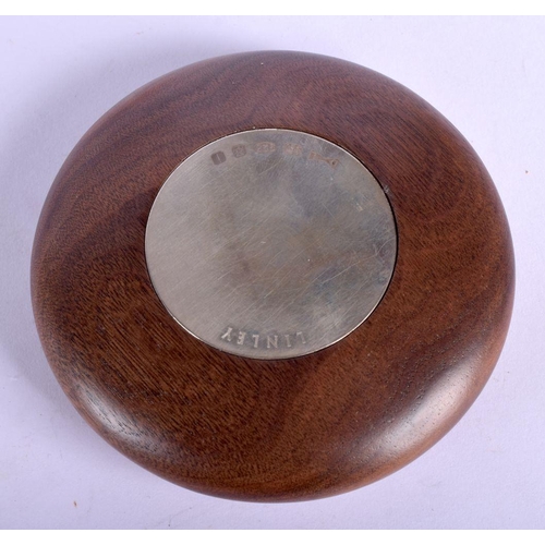 604 - A DAVID LINLEY SILVER PEBBLE PAPERWEIGHT together with a silver letter opener. (2)