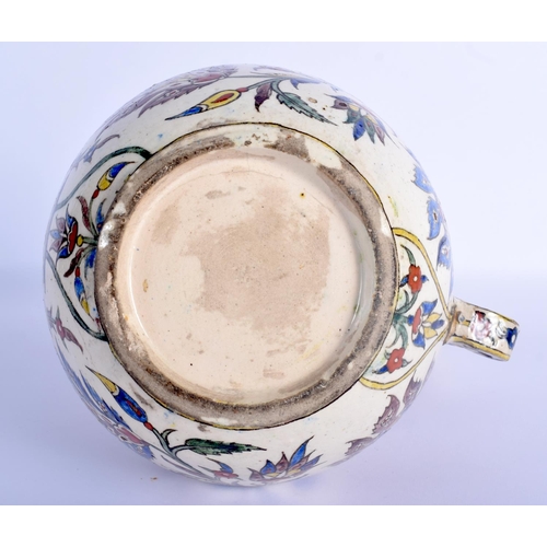 10 - A 19TH CENTURY CONTINENTAL IZNIK FAIENCE GLAZED ENAMELLED JUG possibly Kutahya (Ottoman) painted wit... 