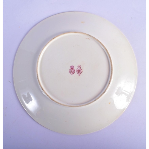 128 - Royal Worcester fine plate painted with a Gypsy girl seated on a log with a baby, too early to be si... 