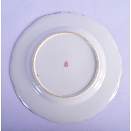 129 - Royal Worcester plate, the centre painted with fruit, signed: 'H. Ricketts', the border with rose sp... 