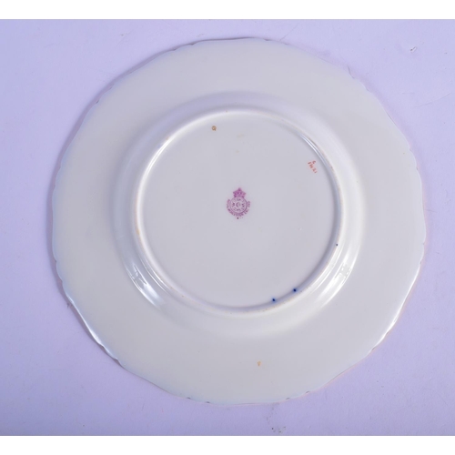 139 - Royal Worcester fine plate  by Raymond Rushton, signed, painted with an English country cottage and ... 