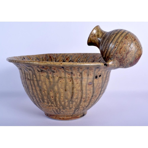 14 - AN UNUSUAL STUDIO POTTERY STONEWARE BOWL unusually modelled with an overlaid amphora. 21 cm x 27 cm.