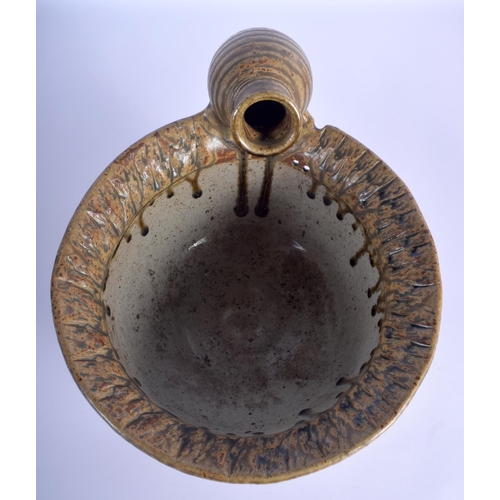 14 - AN UNUSUAL STUDIO POTTERY STONEWARE BOWL unusually modelled with an overlaid amphora. 21 cm x 27 cm.