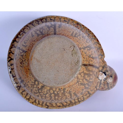 14 - AN UNUSUAL STUDIO POTTERY STONEWARE BOWL unusually modelled with an overlaid amphora. 21 cm x 27 cm.