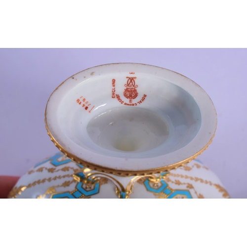 143 - Royal Crown Derby two handled baluster  pedestal vase painted with roses and other flowers with turq... 