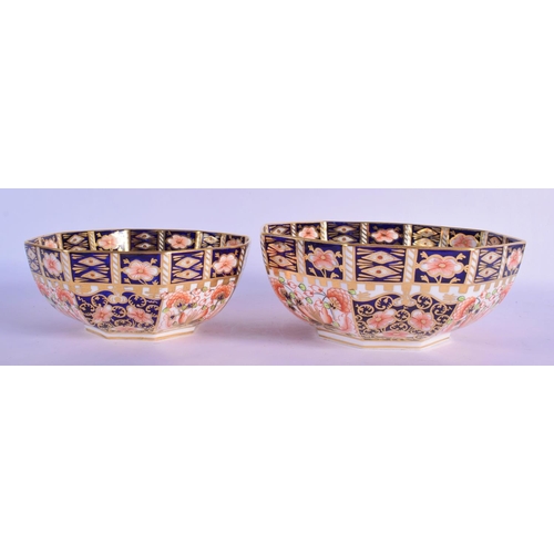 145 - Royal Crown Derby graduated pair of octagonal bowls painted with imari pattern 6299, date code 1918.... 