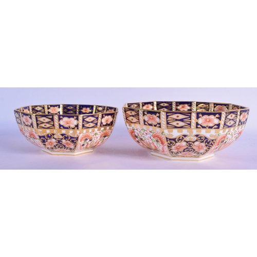 145 - Royal Crown Derby graduated pair of octagonal bowls painted with imari pattern 6299, date code 1918.... 