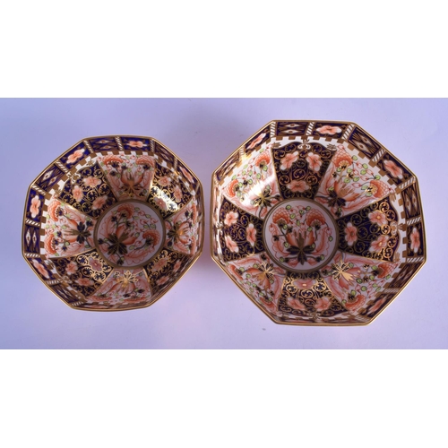 145 - Royal Crown Derby graduated pair of octagonal bowls painted with imari pattern 6299, date code 1918.... 