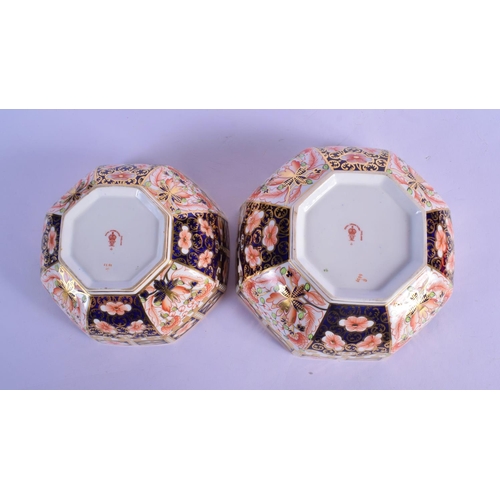 145 - Royal Crown Derby graduated pair of octagonal bowls painted with imari pattern 6299, date code 1918.... 