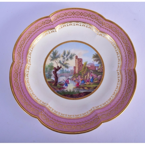 148 - 18th c. Sevres six lobed large dish painted with woman washing clothes in a river with a bridge in t... 