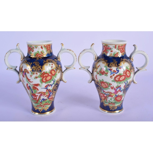157 - A Pair of Worcester two-handled vases c.1770, brightly decorated in the Rich Kakiemon style with pan... 