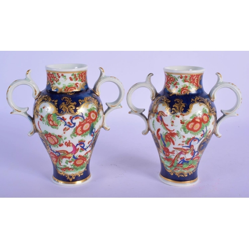 157 - A Pair of Worcester two-handled vases c.1770, brightly decorated in the Rich Kakiemon style with pan... 