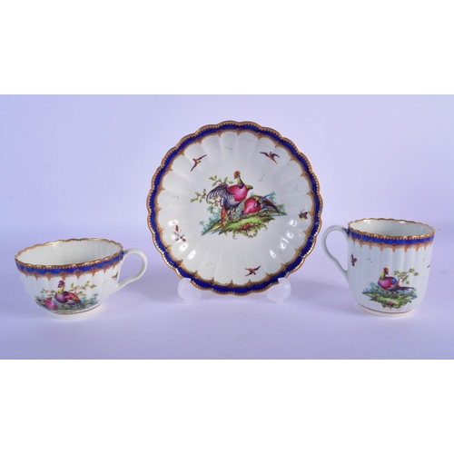 158 - Worcester trio c.1785, comprising a coffee cup, teacup and saucer, the fluted forms painted perhaps ... 