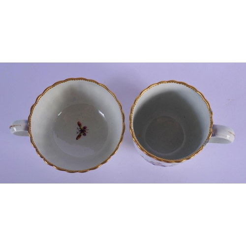 158 - Worcester trio c.1785, comprising a coffee cup, teacup and saucer, the fluted forms painted perhaps ... 