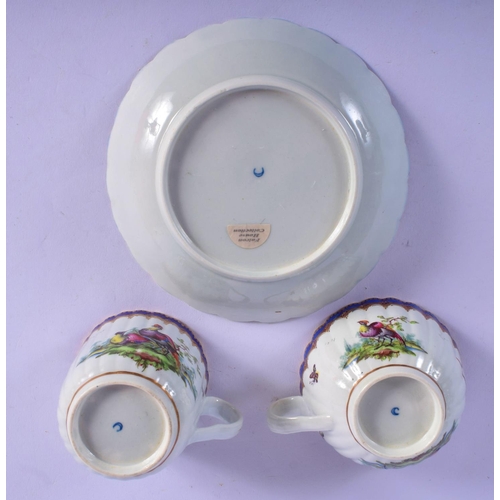 158 - Worcester trio c.1785, comprising a coffee cup, teacup and saucer, the fluted forms painted perhaps ... 