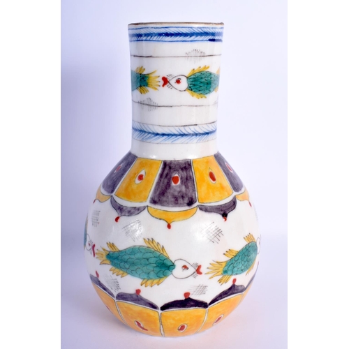 16 - A TURKISH OTTOMAN KUTAHYA FAIENCE TYPE VASE painted with floral sprays. 22 cm high.