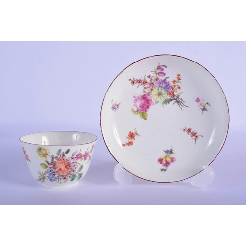 162 - Chelsea teabowl and saucer c.1754, well painted with sprays of flowers, brown line rims, red anchor ... 