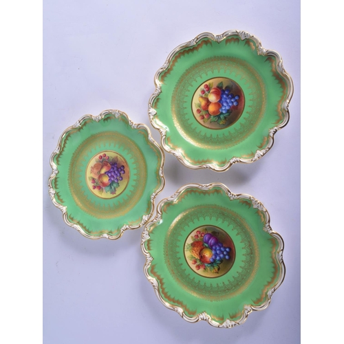 173 - A SET OF GEORGE JONES CRESCENT AND SONS PORCELAIN TEA WARES painted with fruiting panels. Largest 25... 