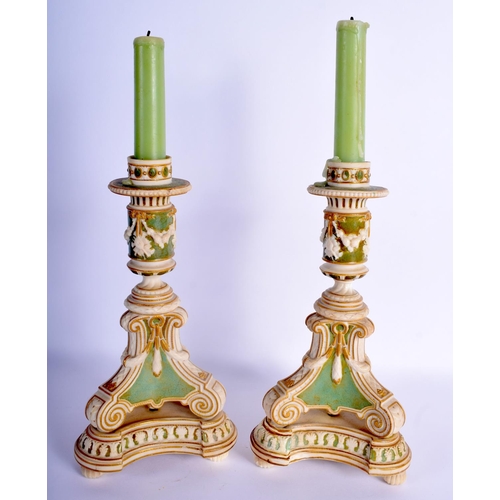 19 - A RARE PAIR OF 19TH CENTURY COPELAND ART UNION PAINTED PORCELAIN CANDLESTICKS overlaid with foliage ... 