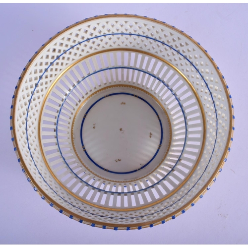 205 - 18th c. Vienna porcelain basket shaped bowl with pierced side picked out in blue and gold, beehive m... 