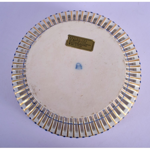 205 - 18th c. Vienna porcelain basket shaped bowl with pierced side picked out in blue and gold, beehive m... 