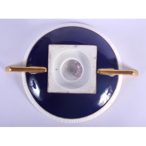 22 - A ROYAL WORCESTER TWIN HANDLED FRUIT PAINTED PORCELAIN PEDESTAL DISH by Bagnall. 20.5 cm wide.