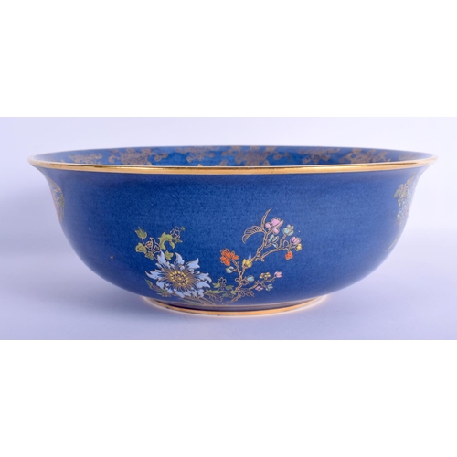 24 - A LARGE ART DECO CARLTON WARE PORCELAIN BOWL enamelled with birds and foliage. 25 cm diameter.