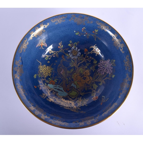 24 - A LARGE ART DECO CARLTON WARE PORCELAIN BOWL enamelled with birds and foliage. 25 cm diameter.