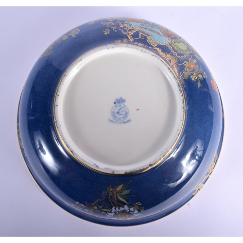 24 - A LARGE ART DECO CARLTON WARE PORCELAIN BOWL enamelled with birds and foliage. 25 cm diameter.