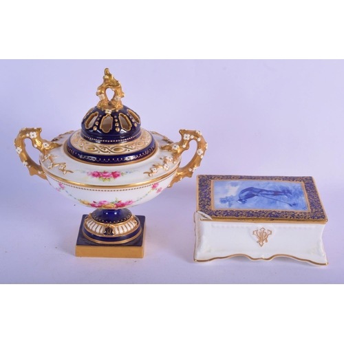 304 - A ROYAL WORCESTER TWIN HANDLED VASE AND COVER together with a Royal doulton golfing box. Largest 17 ... 