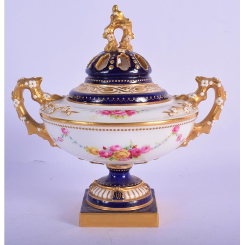 304 - A ROYAL WORCESTER TWIN HANDLED VASE AND COVER together with a Royal doulton golfing box. Largest 17 ... 