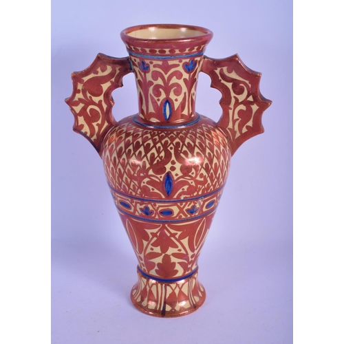 308 - AN ANTIQUE SPANISH HISPANO MORESQUE TIN GLAZED ALHAMBRA VASE painted with motifs. 23 cm high.