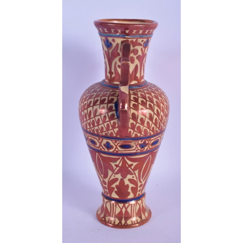 308 - AN ANTIQUE SPANISH HISPANO MORESQUE TIN GLAZED ALHAMBRA VASE painted with motifs. 23 cm high.