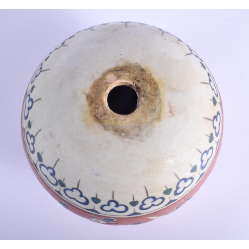 31 - A TURKISH OTTOMAN KUTAHYA FAIENCE TYPE HANGING MOSQUE BALL painted with flowers. 15 cm x 11 cm.