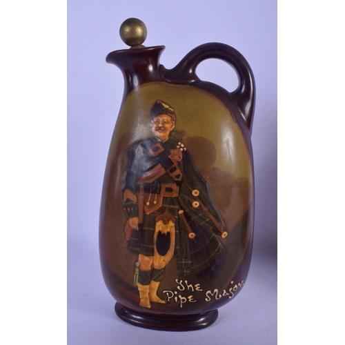 310 - TWO ROYAL DOULTON WHISKEY DECANTERS together with a silver plated majolica jug. Largest 23 cm high. ... 