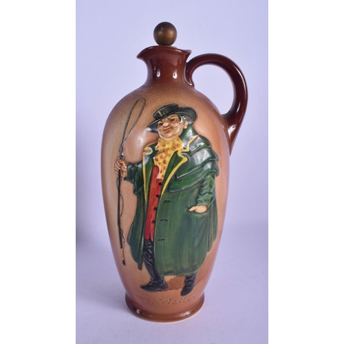 310 - TWO ROYAL DOULTON WHISKEY DECANTERS together with a silver plated majolica jug. Largest 23 cm high. ... 