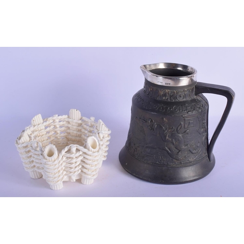 311 - AN ANTIQUE SILVER MOUNTED JOHN GILPIN BLACK GLAZED JUG together with a whitw glazed Moore type bowl.... 